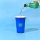 A blue double wall party cup being filled with water, featuring a logo on the front.