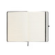 An open A5 notebook with lined pages and a black binding.