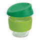 A drink bottle made of borosilicate glass, featuring a green silicone lid and band.