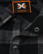 A black and grey plaid unisex flannel button-up shirt featuring snap buttons and a logo tag.