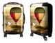 A wheeled suitcase features a colourful hot air balloon design and includes a logo. The suitcase is predominantly yellow and red. A wheeled suitcase features a colourful hot air balloon design and includes a logo. The suitcase is predominantly yellow and red.