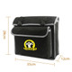 A black portable tool bag with grey trim and a logo, featuring two front pockets and dimensions provided.