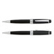 A black metal ballpoint pen with silver accents and a clip. The pen features a logo on its barrel.
