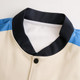 A varsity jacket featuring a beige body, black collar, and blue accents, with a logo on the chest area.