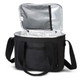 A black canvas cooler bag with a silver insulated interior and a shoulder strap, featuring an outer pocket.