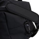 A black soft-touch duffle bag featuring a padded shoulder strap and a clip closure.