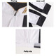 A white and black men's polyester spandex pullover featuring a quarter zip, add cuffs, and piping design. A white and black men's polyester spandex pullover featuring a quarter zip, add cuffs, and piping design.