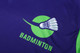 A purple and green badminton shirt featuring a shuttlecock graphic and a logo.