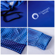 A blue unisex polyester spandex hoodie featuring a patterned design and a logo on the back.