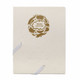 A cream-coloured journal with a decorative gold design and an elastic band closure. It features a logo on the cover.