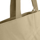 A tan reusable shopping bag with strong handles, featuring a textured fabric and a small logo.