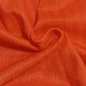 Bright orange fabric with a textured pattern, suitable for breathable sports shorts. Includes a logo or branding.
