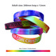 A collection of silicone wristbands in various marble colours, featuring different designs and a logo.