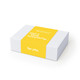 A gift box with a white exterior and a bright yellow band, featuring minimalist text.