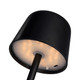 A black mini rechargeable lamp with a circular shade and visible LED lights on the underside, featuring a charging port.