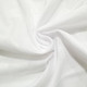 A textured white fabric featuring a breathable and lightweight design, ideal for apparel like t-shirts. A textured white fabric featuring a breathable and lightweight design, ideal for apparel like t-shirts.