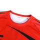 A red crew neck raglan sport T-shirt featuring black design elements and a logo. Made from 100% polyester micro mesh.