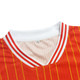 A red half V-neck T-shirt with white and red striped collar and yellow pinstripes, featuring a branding logo.