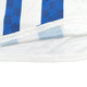A breathable white T-shirt featuring blue checkered stripes, with a set-in shoulder design, and a logo present.
