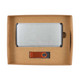 A cardboard gift set containing a sleek power bank and a matching USB drive, both presented in a structured box.