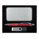 A silver card case, a red and silver pen, and a black USB drive are arranged together in this Harbor Gift Set.