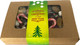 A kraft gift box featuring an assortment of cookies and candy canes, adorned with a decorative band.