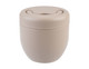 A vacuum food pod in a soft beige colour with a smooth, rounded design and a lid featuring a circular opening.
