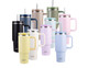 A drink bottle collection featuring various colours, including black, beige, green, pink, and blue, with straws and handles. A drink bottle collection featuring various colours, including black, beige, green, pink, and blue, with straws and handles.
