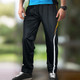 Black custom men's sports pants with yellow and white accents, featuring a logo on the leg.