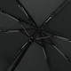 A black recycled tipless umbrella with a sleek design and visible metal framework.