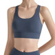 A women's cross back yoga crop bra tank in a dark blue hue, featuring a sleek and minimalistic design.