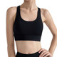A black women's cross back yoga crop bra tank featuring a fitted design and a logo.