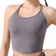 A grey women's seamless thin-strap racerback yoga bra tank, featuring a fitted design and minimalist style.