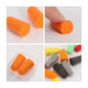 Ear plugs in various colours, including orange, grey, and black, displayed in a case and separately.