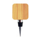 A bamboo wine stopper with a metallic base and a sleek design, featuring a square top.