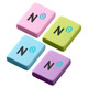 Four rectangular rubber erasers in pink, green, blue, and purple, each with a logo on the surface.