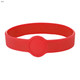 A red silicone wristband featuring a circular section and a logo. Suitable for custom designs.