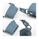 A drink bottle holder made of blue leather with silver metal hardware and adjustable straps.
