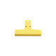 A yellow plastic magnetic clip with a flat design and a hole for hanging. It features a logo on the surface.