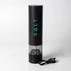 A rechargeable black pepper and salt grinder with a transparent base and USB charging cable. It features a logo.