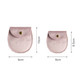 A pink oval velvet jewelry pouch with a golden snap closure, featuring two sizes displayed alongside each other.