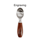 A stainless steel ice cream scoop with a smooth wooden handle and a logo engraving.