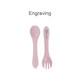 A pink silicone spoon and fork set for kids, featuring a logo and smooth, rounded edges.