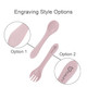 Two pieces of pink silicone cutlery, including a spoon and fork, with an engraved logo on each piece.