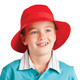 A red kids' twill bucket hat with toggle featured on a smiling child wearing a collared shirt.