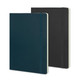 A large Moleskine Classic Soft Cover Notebook in dark green and black, featuring a spine and elastic closure.