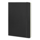 A large black soft cover notebook with an elastic band closure and a cream-coloured interior.
