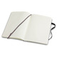 A large, soft cover Moleskine notebook with lined pages and a ribbon bookmark, featuring a black exterior.
