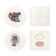 Four round paper coasters featuring various designs, including illustrations and logos, in cream and white tones.