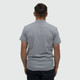 A men's polo shirt in grey, featuring a back view with a fitted design and a small logo.
